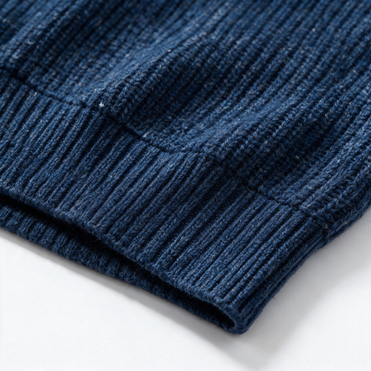 Close-up of the wide ribbed hem band of the Fints sweater
