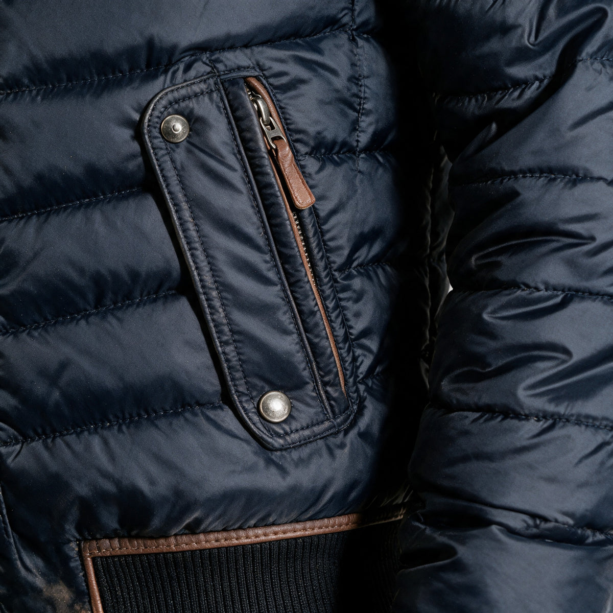 Holloway lower zip pocket with brown trim