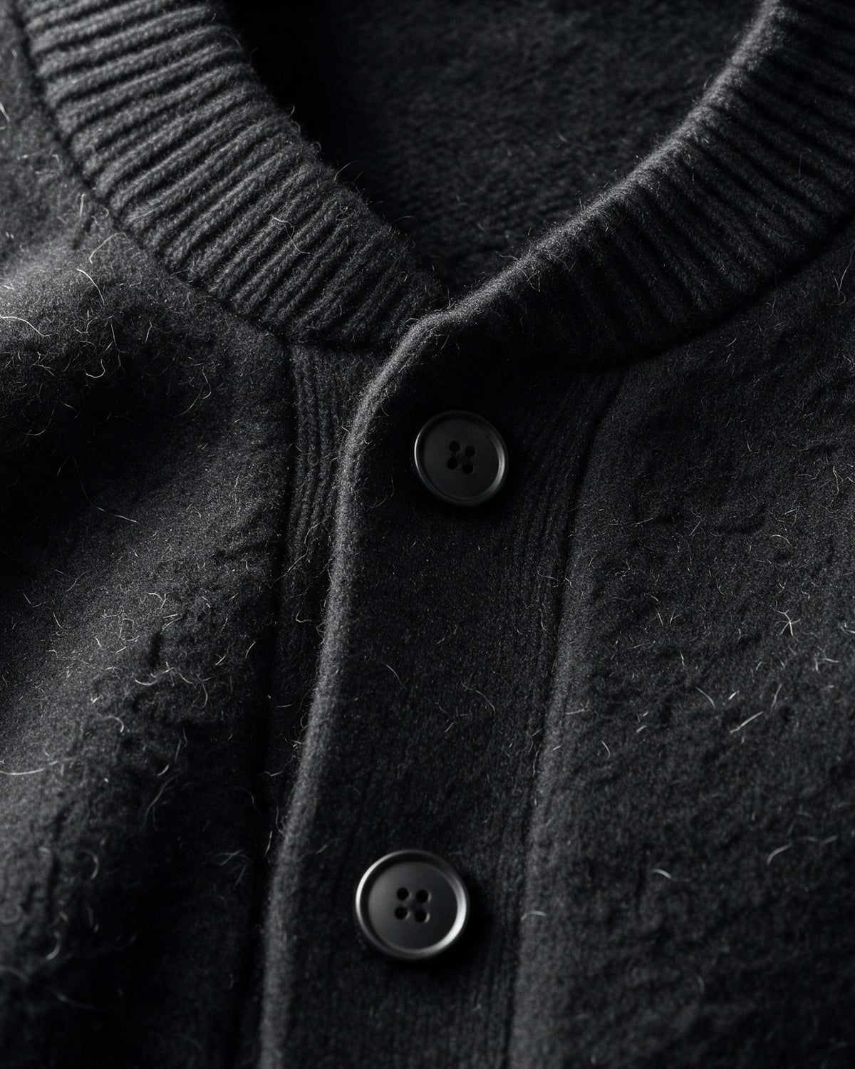Ribbed collar and button placket close-up