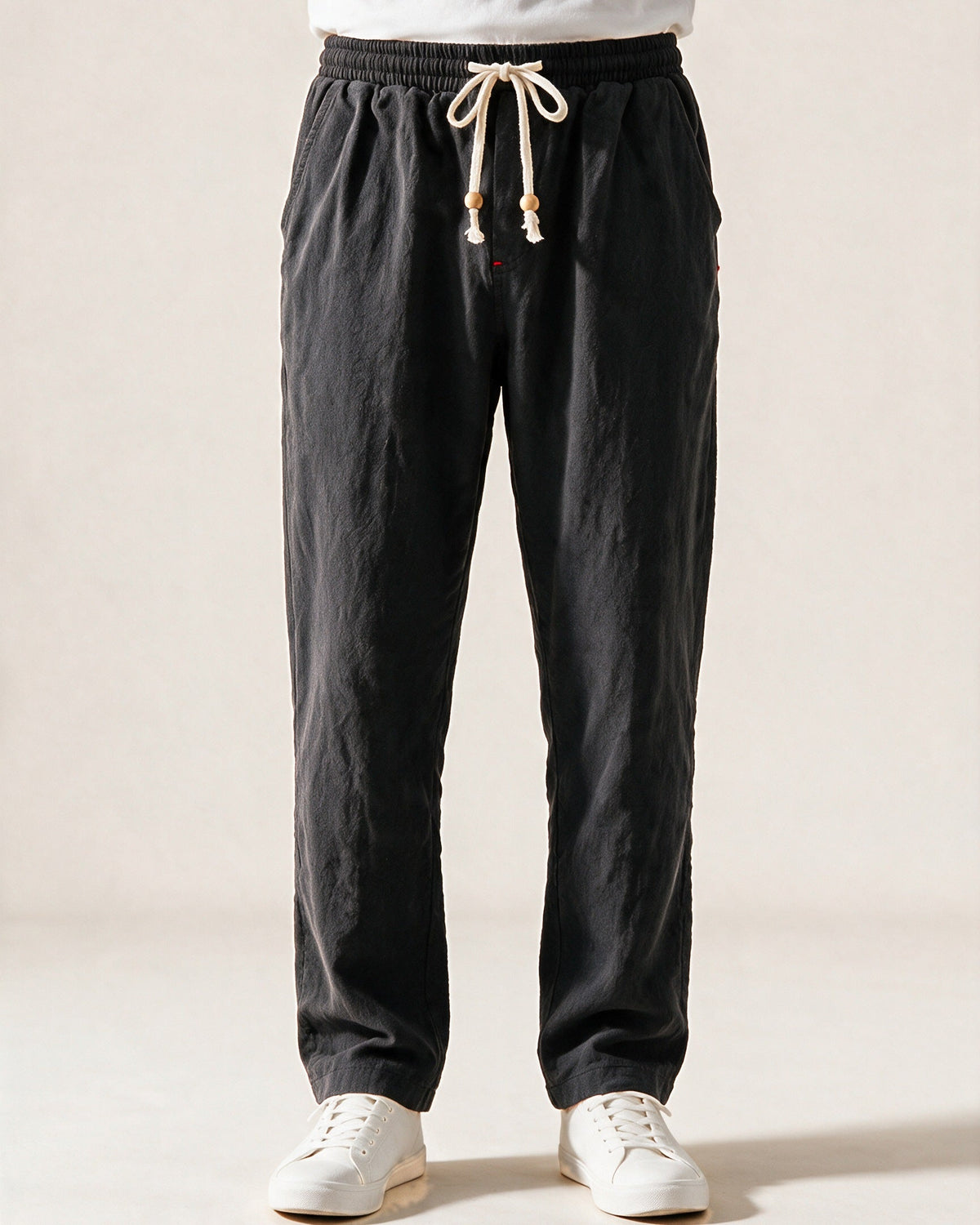Whitby drawstring trousers in Black, front view
